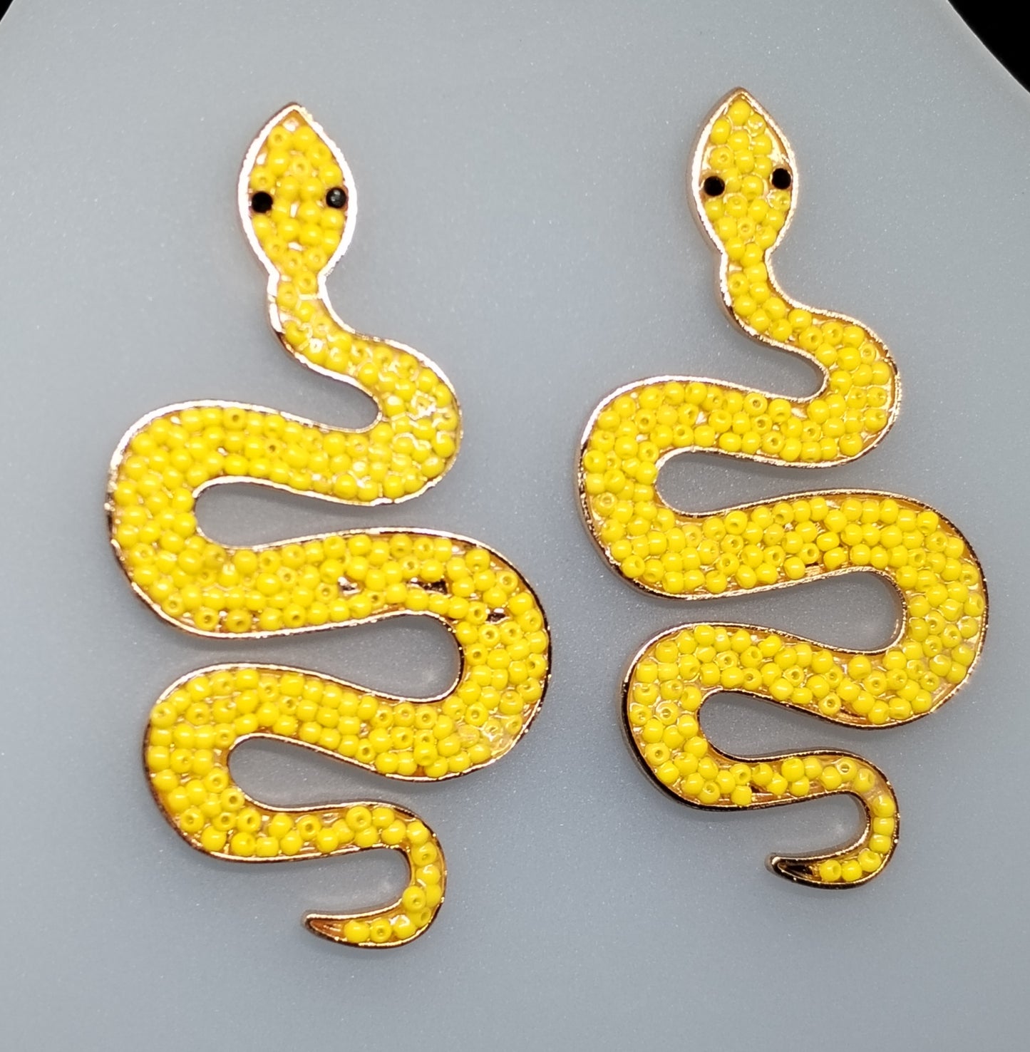 Beaded snake earrings
