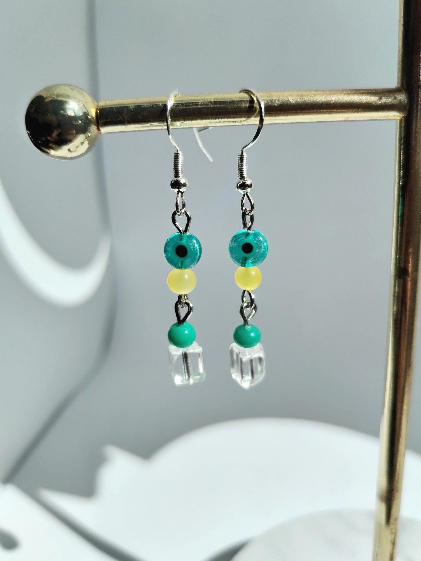 Green evil eye beaded earrings