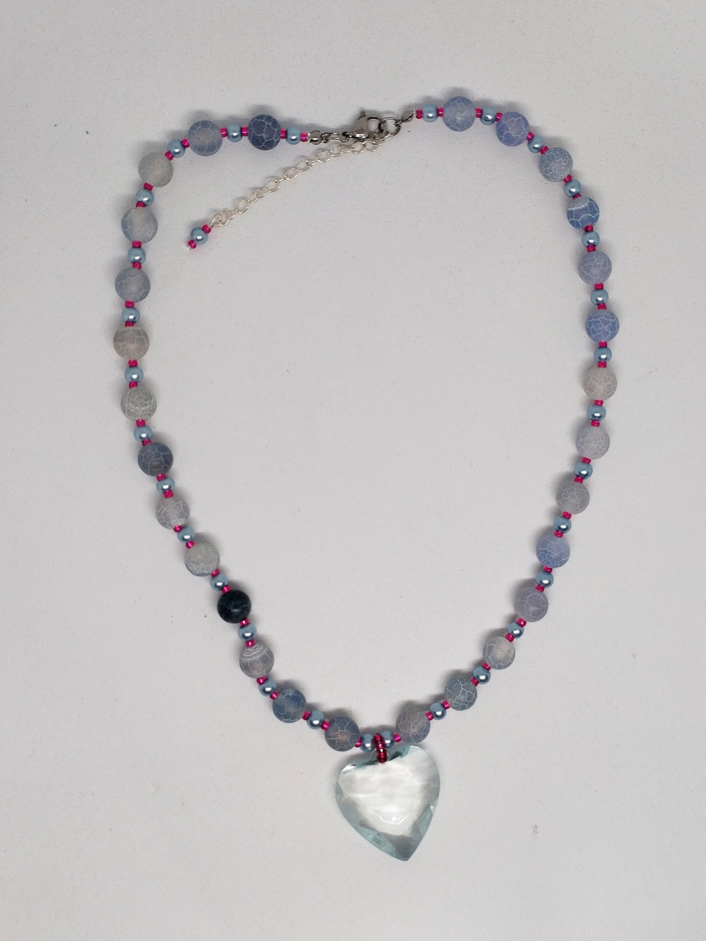 Blue & pink beaded necklace with a heart pendant