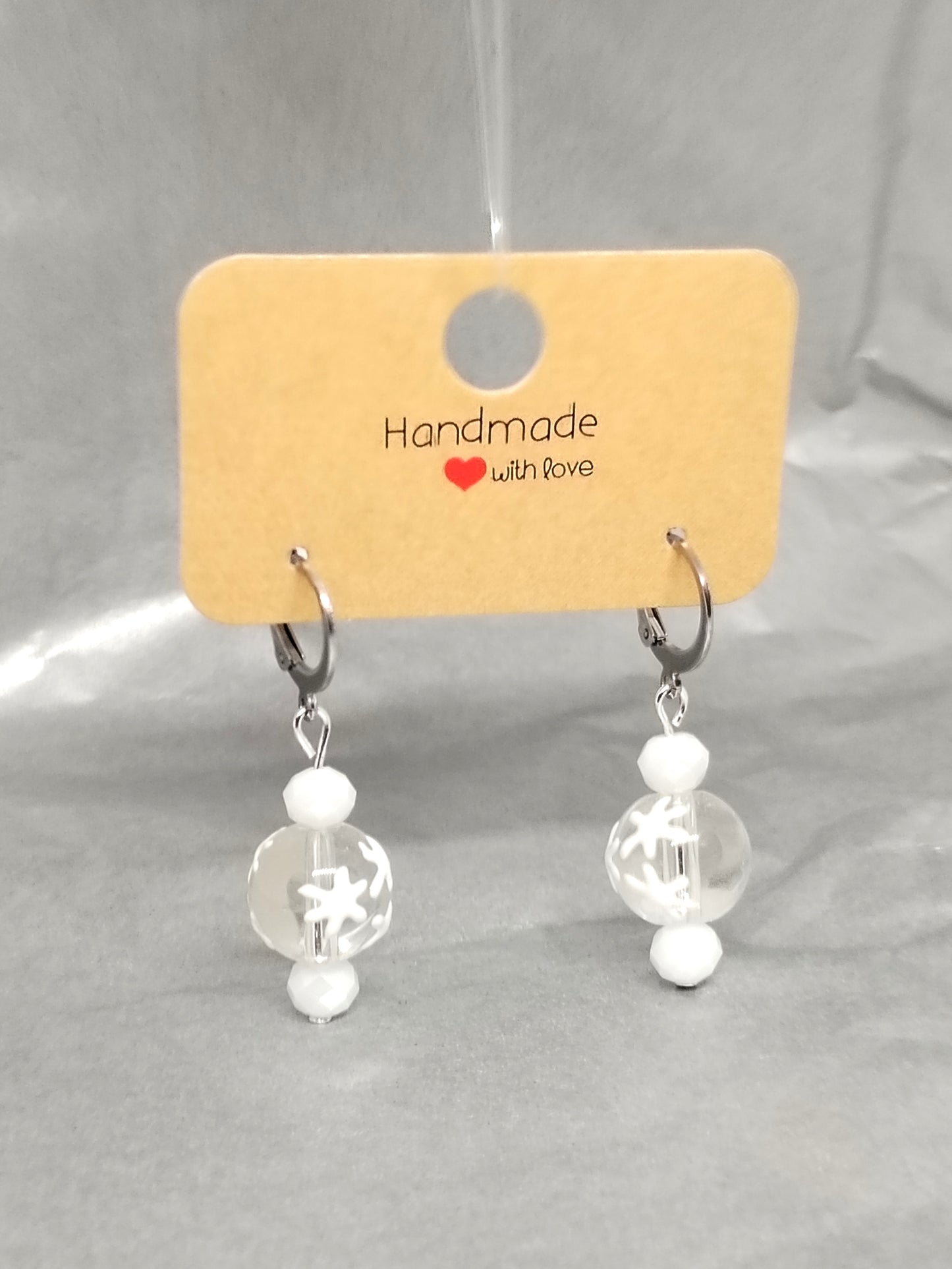 White snowflake huggies