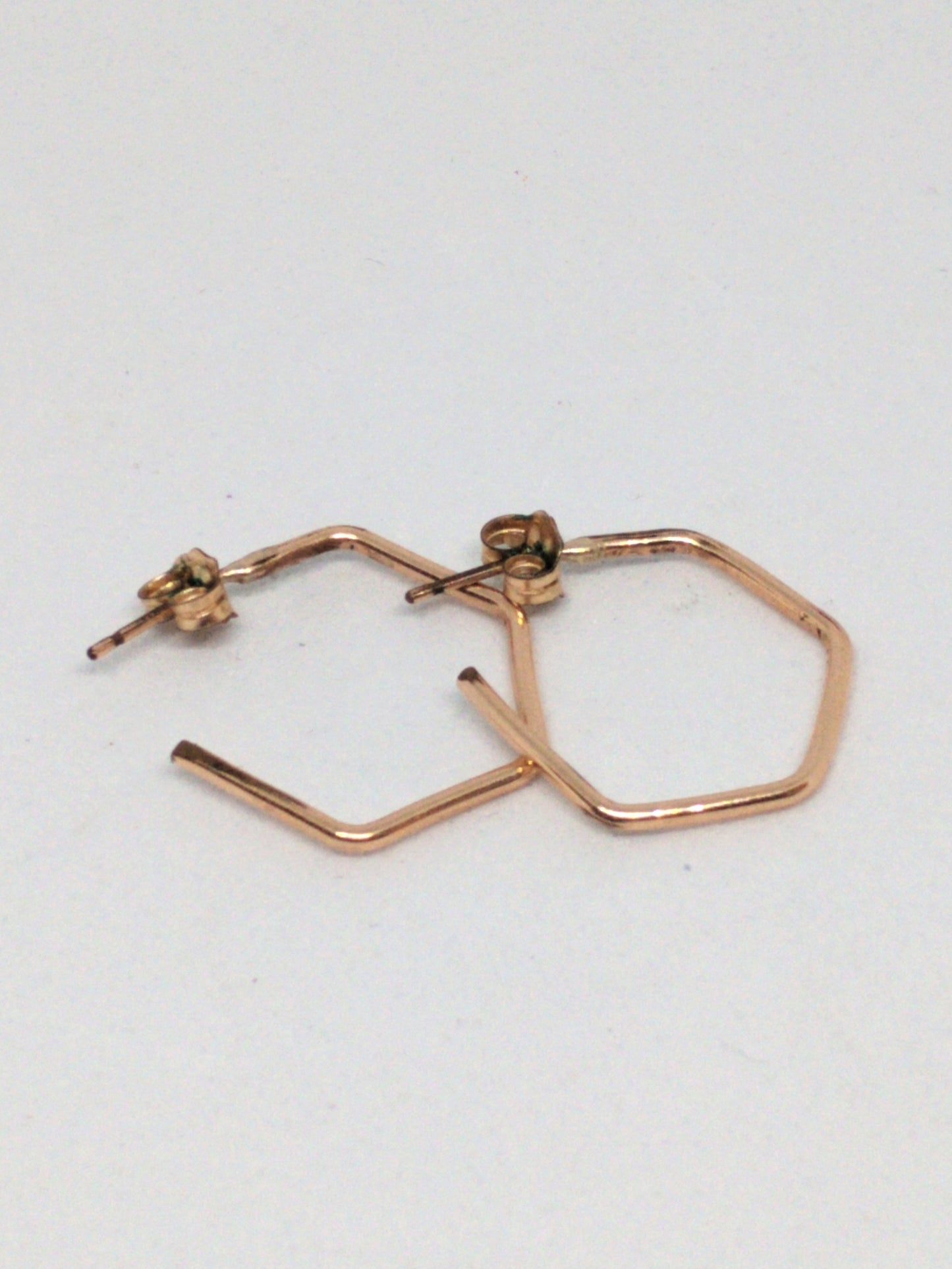 Rose gold angled hoops