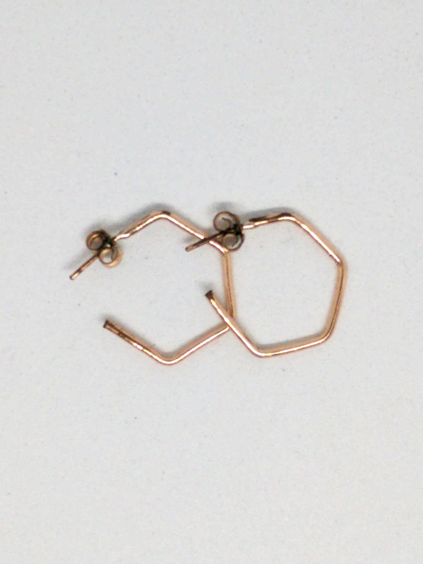 Rose gold angled hoops